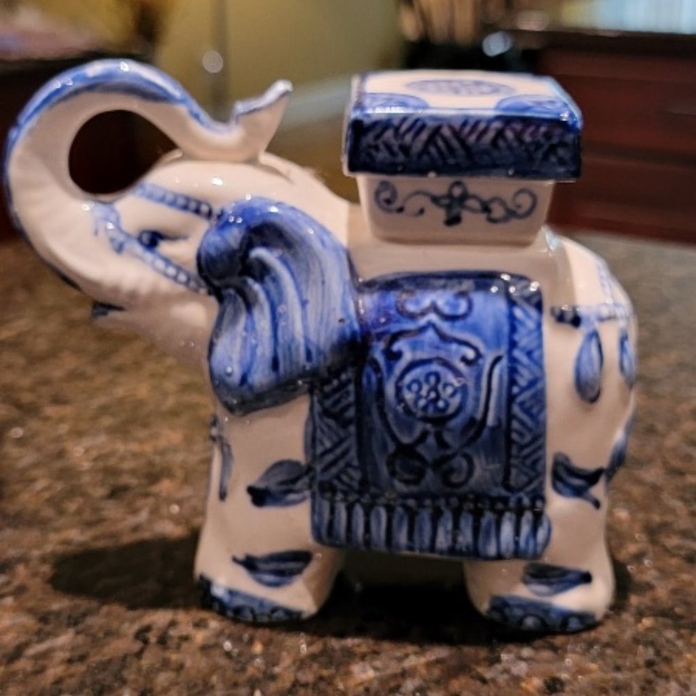 Antique Ceramic blue and white Asian motif elephants candle holders, bookends